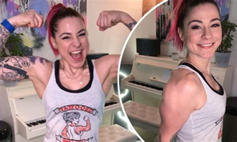 Lucy Spraggan Proudly Shows Off Her Tattooed Arms As She Reveals