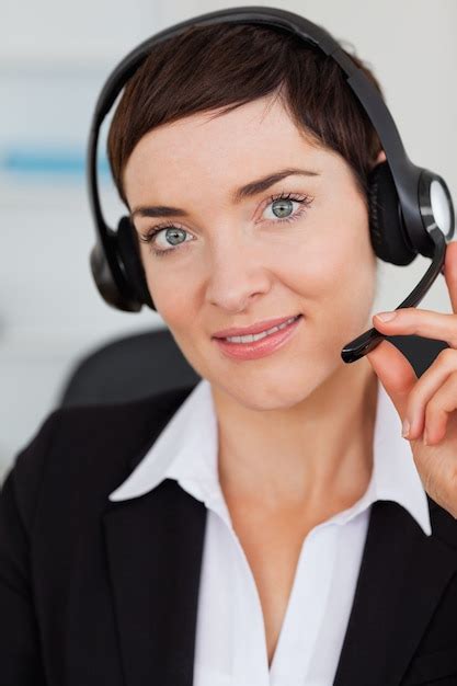 Premium Photo Portrait Of A Cute Secretary Calling With A Headset