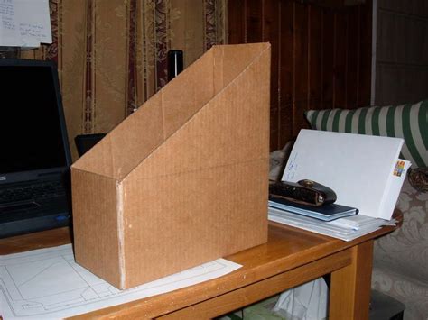 Though many magazines will change the color of their title from issue to issue, the font is. Homemade Cardboard Magazine Box | Diy magazine holder, Diy ...