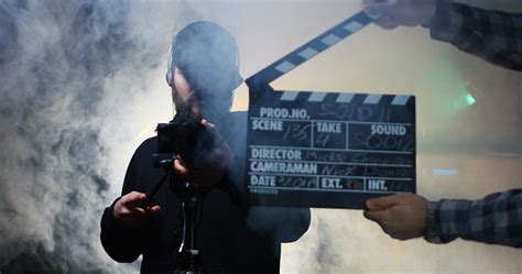 Film Crew Shooting Take Of Scene In Studio Stock Photo Download Image