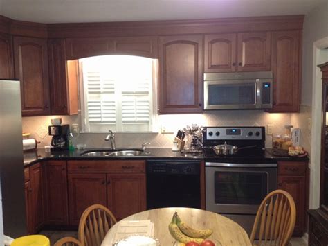 Maybe you would like to learn more about one of these? Shenandoah Cabinetry: Winchester Maple, Cognac Finsh ...