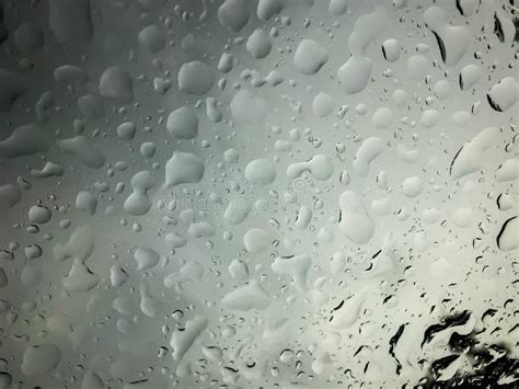 Abstract Water Drops On The Glass In Rainy Day Season Stock Image