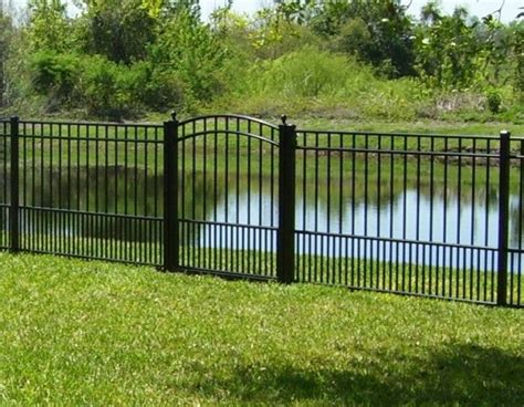 This shadowbox fence has pickets alternating on each side, offering some privacy but allowing you to look through the fence at an angle. Gorgeous Freedom Black Aluminum Fence Gate | Aluminum fence gate, Aluminum fence, Fence gate design