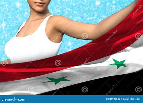 woman holds syrian arab republic flag in front on the light blue shining sparks background