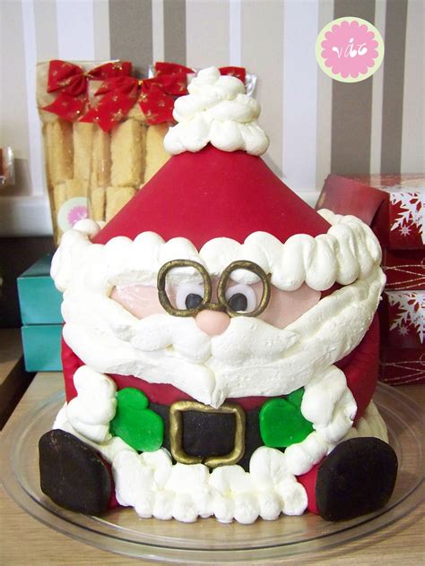 Birthday cakes are often layer cakes with frosting served with small lit candles on top representing the celebrant's age. Santa Birthday Cakes