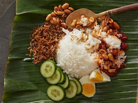 Nasi lemak, a spicy coconut rice, is the national dish of malaysia, where it is eaten for breakfast. ON HAWKER: Nasi Lemak - Appetite
