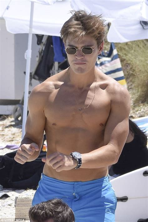 Oliver Cheshire Flaunts His Hunky Physique As He Goes Shirtless During