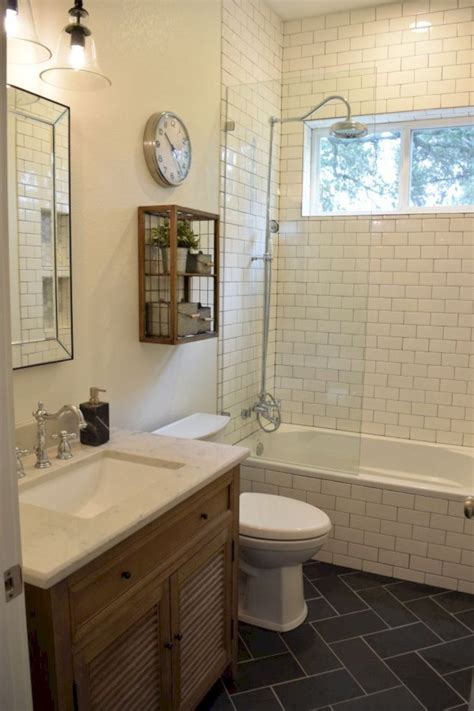 The tile works well to give the room an open feeling, working with the open area under the sink. 116 Rustic Farmhouse Bathroom Ideas with Shower | White ...