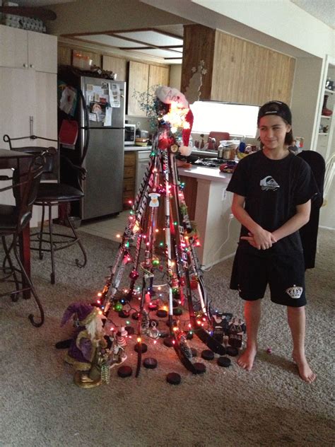 Hockey Sticks Tape Twinkle Lights Pucks Christmas Ornaments And A Kid