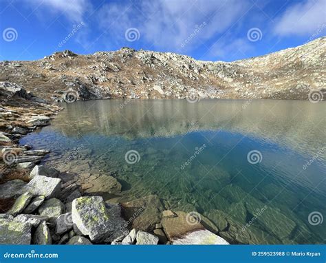 A Crystal Clear Alpine Lakes Laghi D`orsirora During A Beautiful Autumn