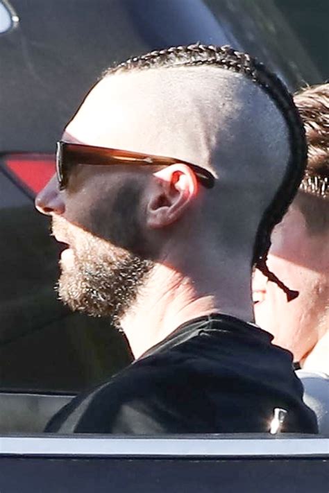 Adam levine is pictured here with his trademark brunette mullet while performing with his band. Adam Levine's Cornrows And Shaved Head Are Just A Lot To ...