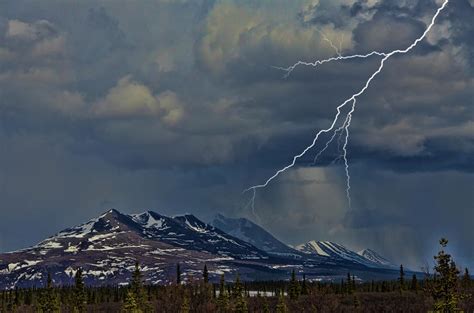 Lightning Over Mountains Photograph By Mark Newman Fine Art America