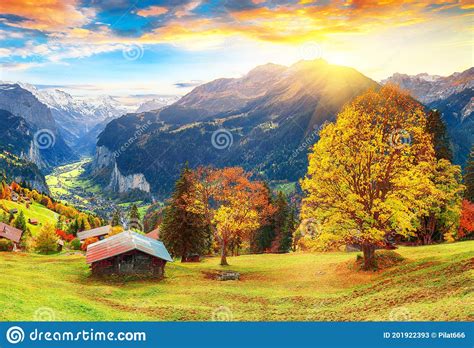 Fabulous Autumn View Of Picturesque Alpine Wengen Village And