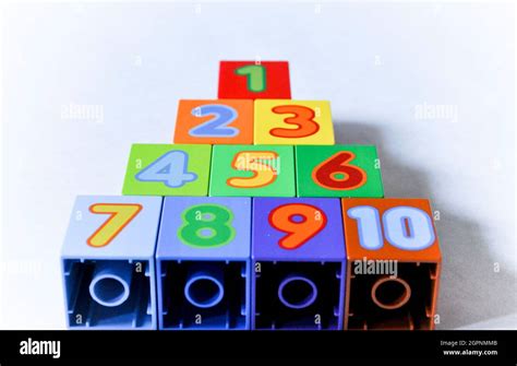 Duplo Numbers Forming A Pyramid With Number 1 At The Top The Image Is