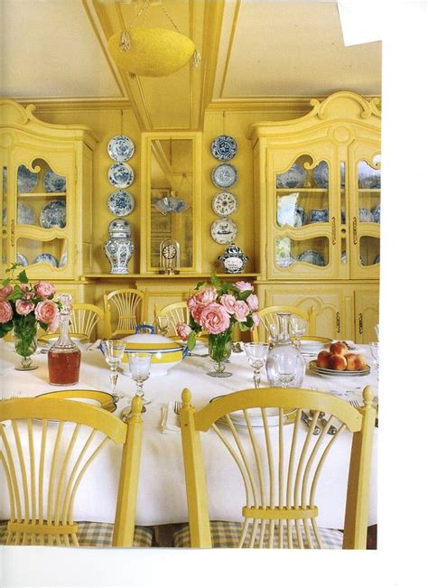 Two similar patterns are used within the room—one pattern in the yellow curtains and the other in the area rug. Room of the Day: Monet's Yellow Dining Room ~ love this ...