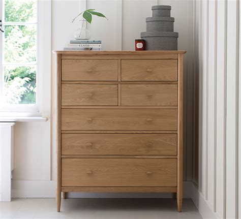 The top lid is 9.5 in. Teramo Bedroom 7 drawer tall wide chest - ercol furniture