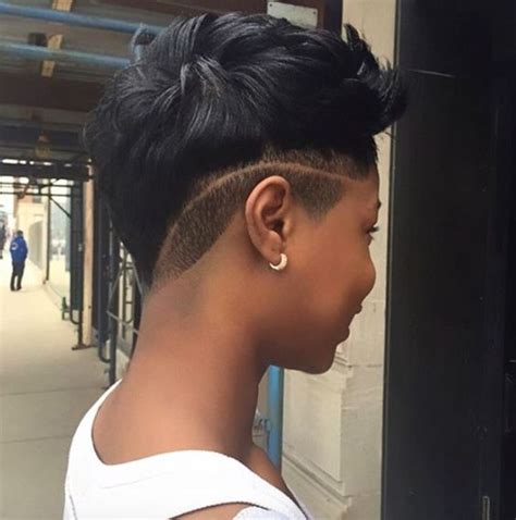 Her hair is parted on one side so as to show off her incredible bone structure. 40 Mohawk Hairstyles For Black omen