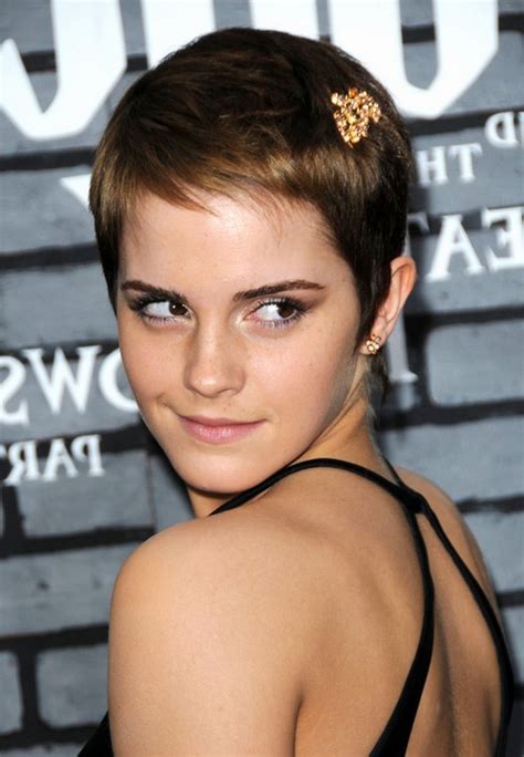 Part your hair deeply to one side and then blow it dry, using a large round brush and a concentrator nozzle on your dryer. Emma Watson Cute Short Pixie Haircut for Summer | Styles Weekly