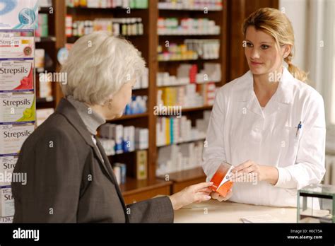 Pharmacy Pharmacist Customer Stock Photo Alamy