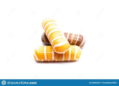 Orange And Brown Candy Canes Isolated In Studio Stock Image Image Of