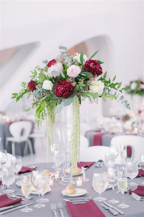 29 Tall Centerpieces That Will Take Your Reception Tables To New