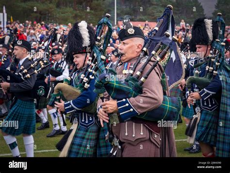 The Massed Pipes And Drums Parade In The Arena During The Braemar Royal