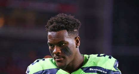 Kansas city chiefs defensive end frank clark chiefs envelops tampa bay buccaneers quarterback tom. Frank Clark is in the company of the elite