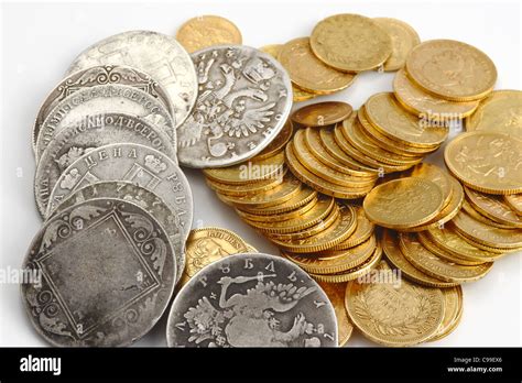 Silver And Gold Coins Stock Photo Alamy