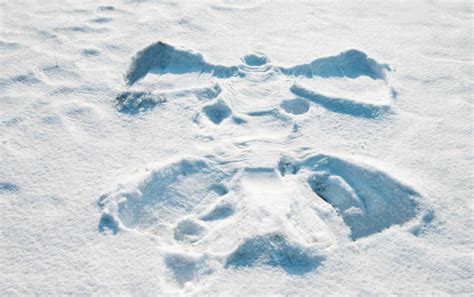 Silhouette Of The Snow Angel Stock Photos Pictures And Royalty Free