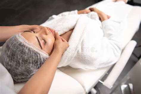 professional masseuse massaging lady face at spa salon stock image image of cosmetology care