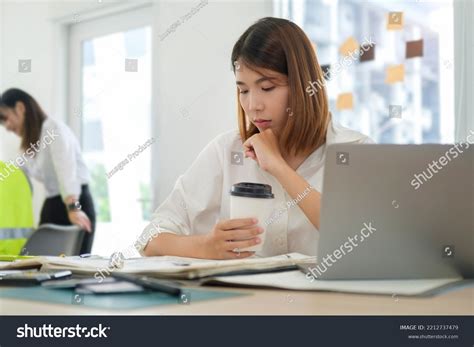 Serious Architect Working On Architectural Plan Stock Photo 2212737479