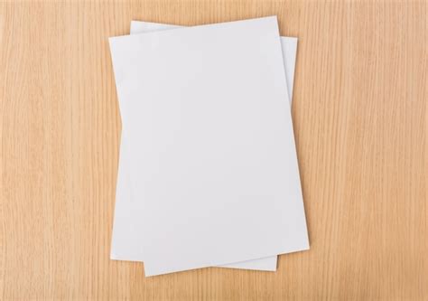 Top View Of Pieces Of Paper On Wooden Table Photo Free Download