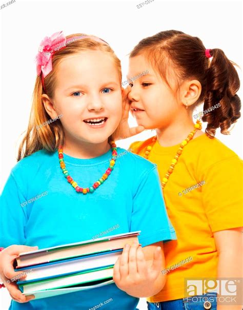 Two Little 6 7 Years Old Asian And Caucasian Girls With Pile Of Books