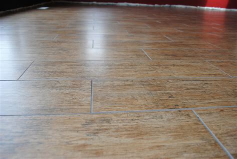 Porcelain tiles can have the effective quality to look like wood even though they are the a type of ceramic tile. Porcelain Tile That Looks Like A Wood Floor Surface