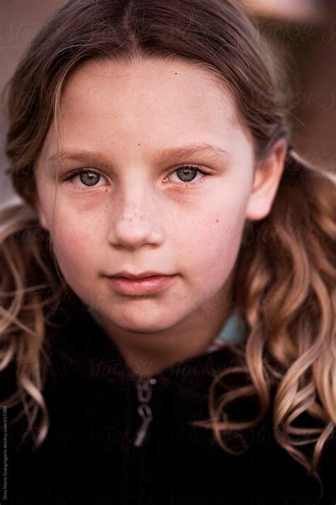 Portrait Of Young Girl With Pigtails And Freckles By Dina Marie