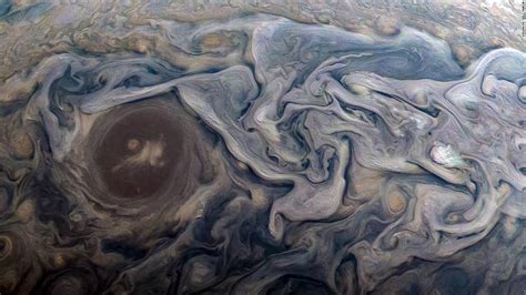 Nasas Juno Probe Sends First Jupiter Moons Photo Cnn