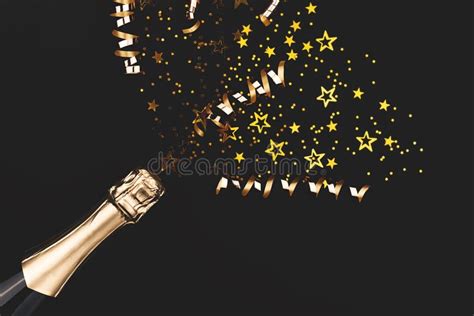 Creative New Year Composition With Champagne Bottle And Confetti Stock