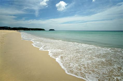 Karon Beach At Phuket Province Thailand By Dangdumrong