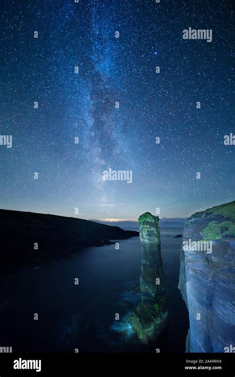 Milky Way Setting Over Yesnaby Sea Stack Orkney Islands Stock Photo
