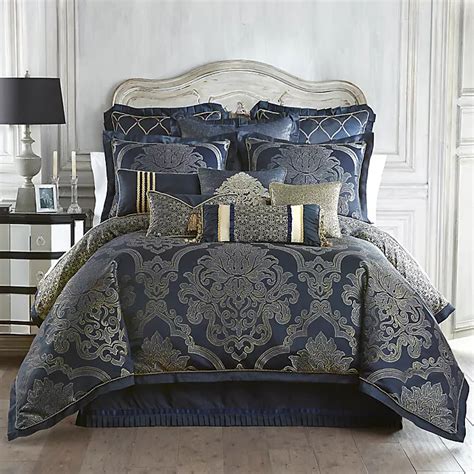 Waterford® Linens Vaughn Reversible Comforter Set In Navygold Bed