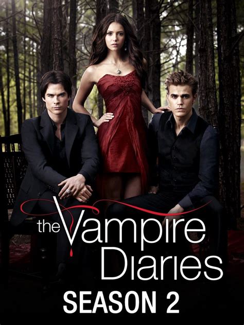 The Vampire Diaries Season 2 Poster With Two Men And A Woman Sitting On