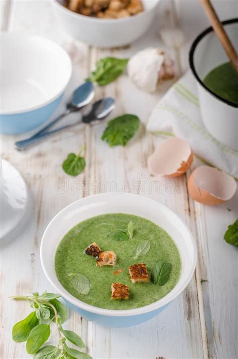 Stir in cornstarch slurry to thicken the soup slightly. Spinach Soup With Poached Egg Stock Image - Image of freshness, cooking: 117053667