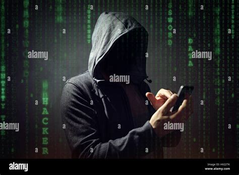 Computer Hacker With Mobile Phone Smartphone Stealing Data Stock Photo