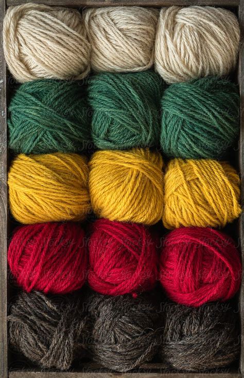 Colorful Yarn Balls In Crate By Pixel Stories Stocksy United Yarn