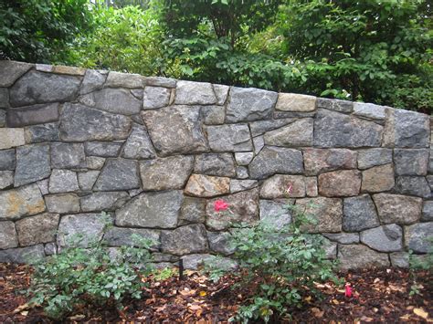 Retaining walls are a great way to bring definition to your property and turn unusable space into useful space in the landscape. Coach House Crafting on a budget: Scrap wood gardening helpers