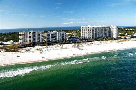 The main public beach access is along gulf shores parkway where highway 59 dead ends into the gulf. Aerial view of the Beach Club, on the Fort Morgan ...