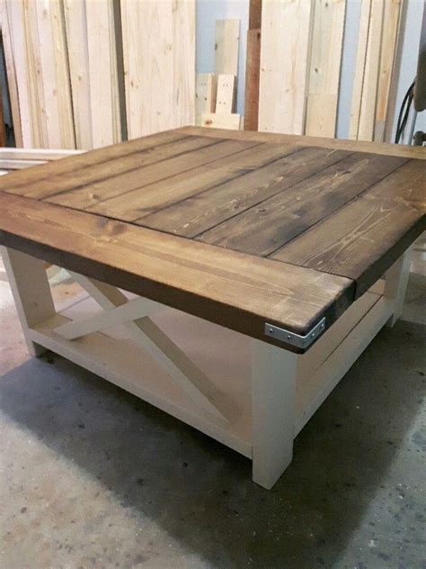 Bring this coffee table home that will add a vintage touch and amplify the look of your home interiors. 38" square coffee table in dark walnut and antique white ...