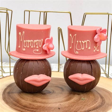 Tap and unwrap to reveal orange segment shaped chocolates available in terry's dark chocolate orange or terry's milk chocolate orange, sold separately Terrys Chocolate Orange With Pink Hat And Lips By Sweet ...