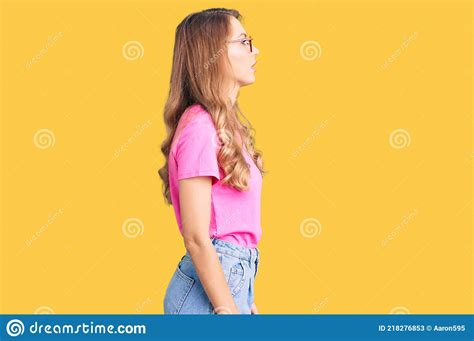Young Beautiful Caucasian Woman With Blond Hair Wearing Casual Clothes