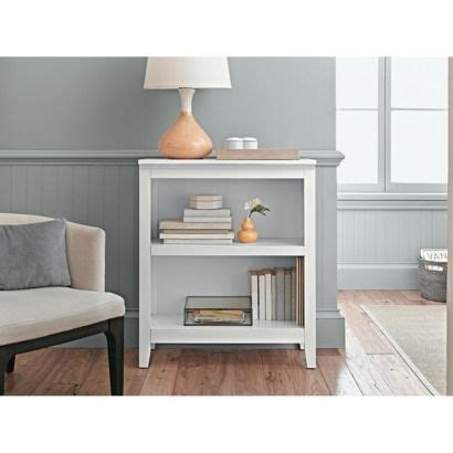 This horizontal bookcase has an adjustable shelf on each side and 3 fixed shelves in the center for customized, storage needs. Pin on House decor ideas